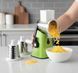 Ручна овочерізка-мультислайсер Kitchen Master &mdash; механічна терка для овочів та фруктів з 3 змінними насадками, вакуумним кріпленням, зеленого кольору 1275 фото 5